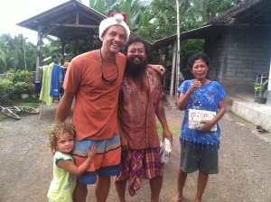 Santa delivering gifts to Bayu''s parents in the village